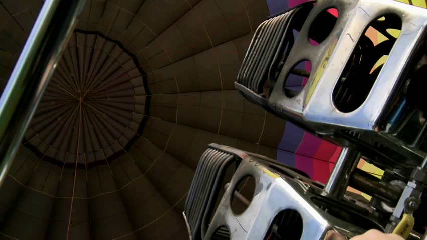Firing up hot air balloon, prior to liftoff for a scenic flight of Canterbury.