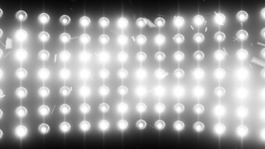Bright flood lights background with particles and glow. White tint. Seamless loop.