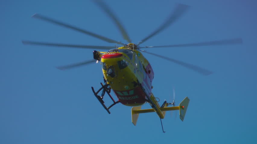 SYDNEY, AUSTRALIA â JUNE 2012: A Westpac lifesaver rescue helicopter flies during a search and rescue mission on June 9, 2012 near La Perouse, Sydney, Australia.