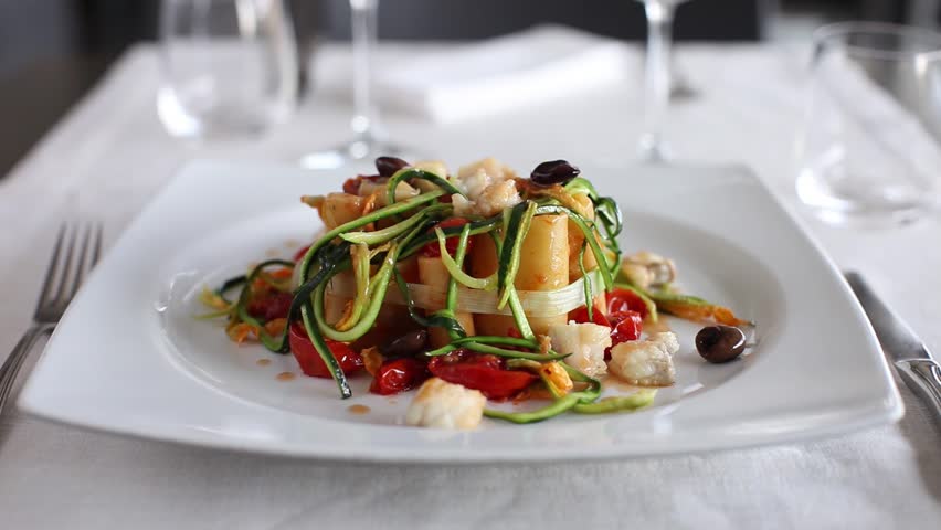 Italian pasta with tomatoes and vegetables. 360 rotation food