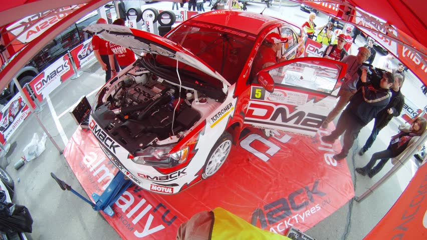 MOSCOW - APR 21: (Timelapse View) Photographers snapshot car of team ALM RUSSIA before start, on Rally Masters Show, on April 29, 2012 in Moscow, Russia