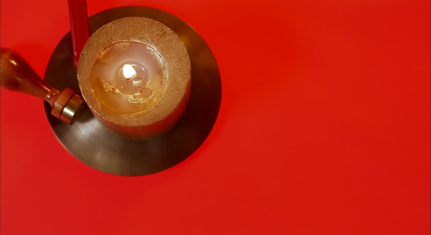 A candle, stamp and a stick of sealing wax