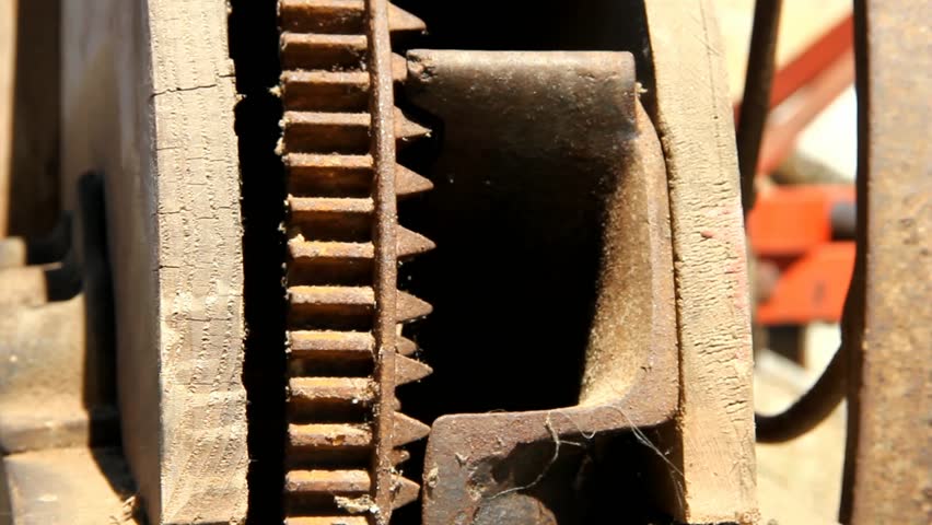Rusted And Dusty Antique Corn Grinder In Shaking While Operating
