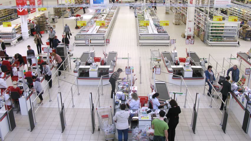 SAMARA - MAY 5: (Timelapse View) Woman pays cashier at superstore Auchan, on May 5, 2012 in Samara, Russia. There are currently 50 Auchan superstores in 19 Russian cities.