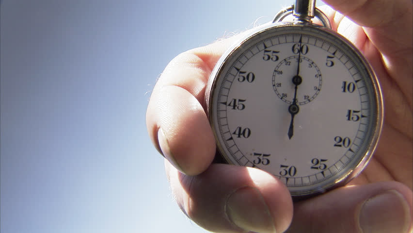 One person starting up a stopwatch.