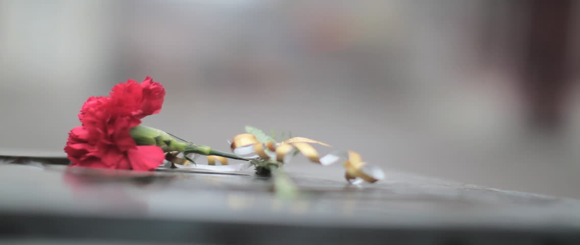 flower on tombstone