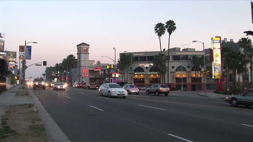 Los Angeles, CA - CIRCA February 2006: View of the iconic Sunset Boulevard at the ironic time of dusk.