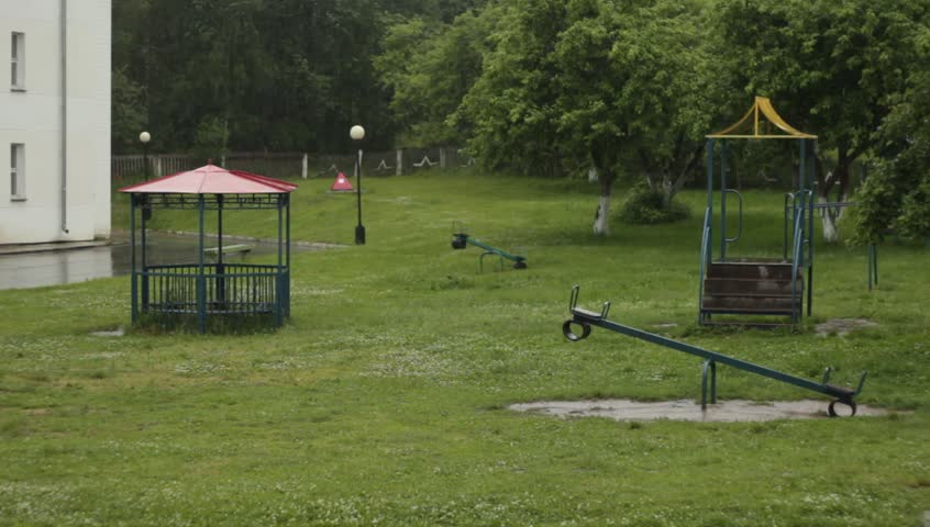 Summer rain on the playground