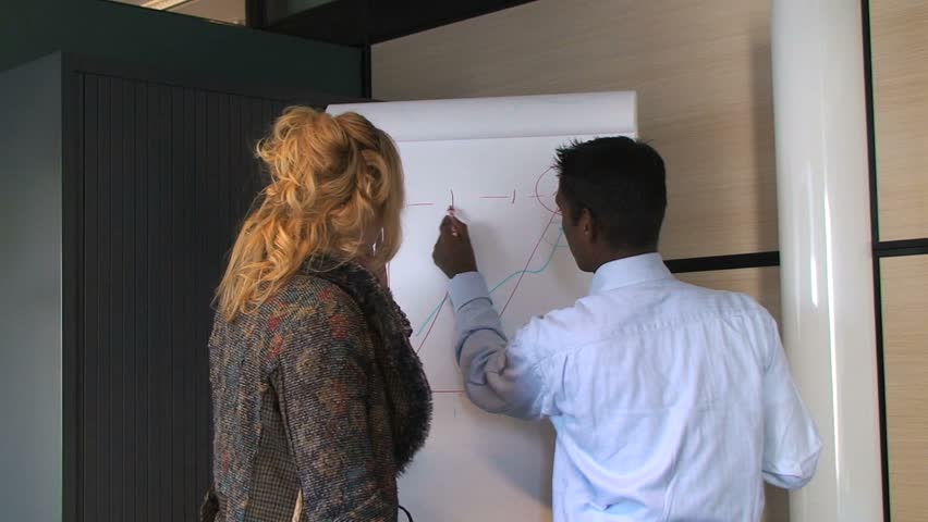 Successful Business Partners Celebrating with Graph Chart