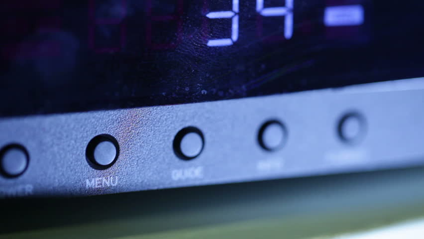 Pressing buttons on the cable box