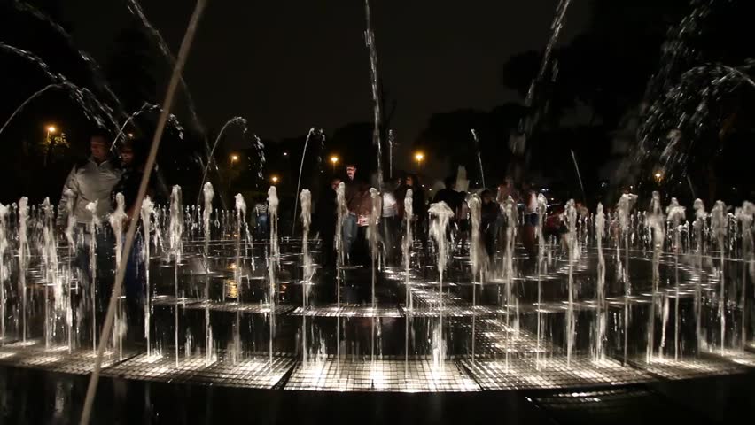 LIMA - CIRCA JUNE 2012: People visit "magic water tour" at Park of the Reserve (Parque de los aquas) in Lima, Peru. June 2012
