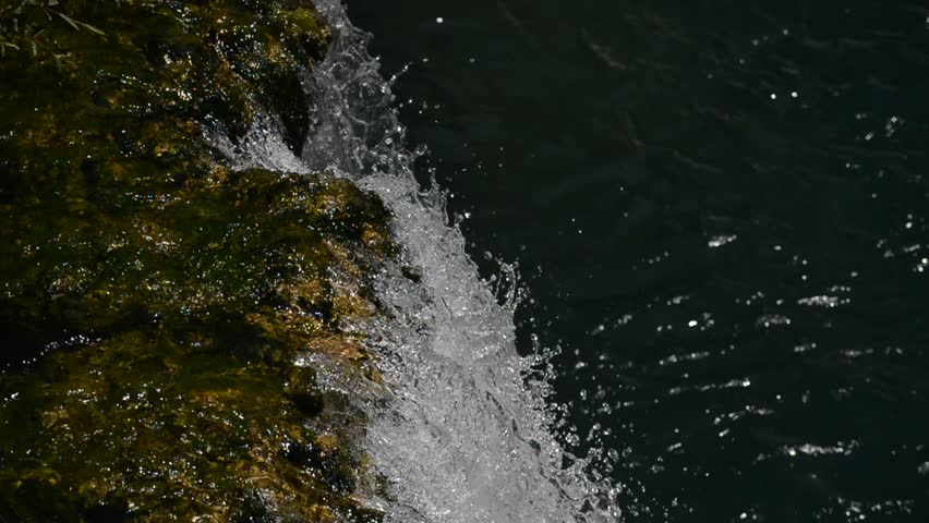 waterfall with fresh clean water in green nature