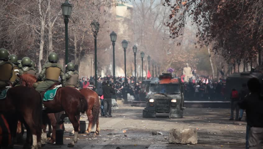 SANTIAGO, CHILE - AUGUST 9: Chilean riot disperse protesters during a student strike on August 9, 2011 in Santiago, Chile