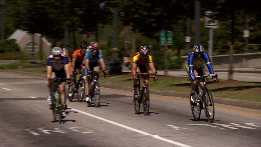 PROVIDENCE, RHODE ISLAND - SEPTEMBER 3, 2009: Pack of bicycle racers rounding street corner in race