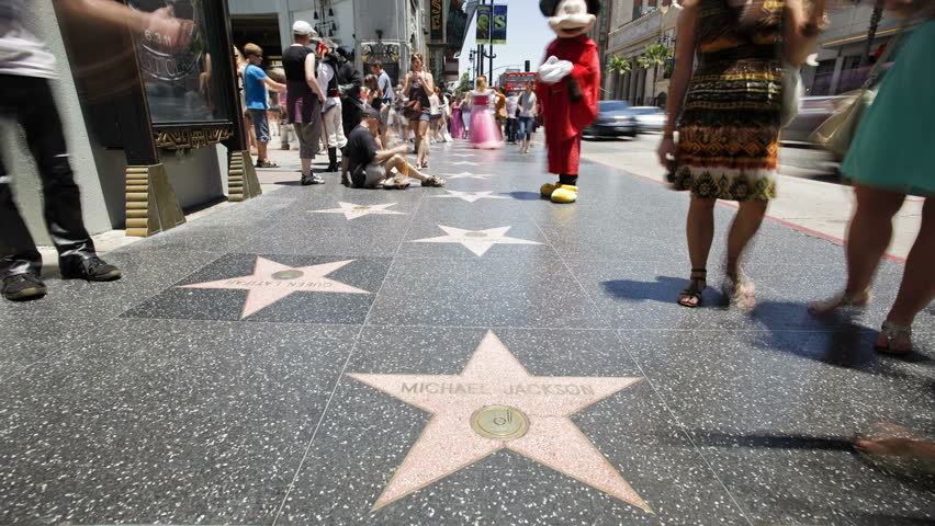 LOS ANGELES - CIRCA MAY 2011: a shot of the Hollywood Boulevard and Hollywood Walk of Fame with people walking by