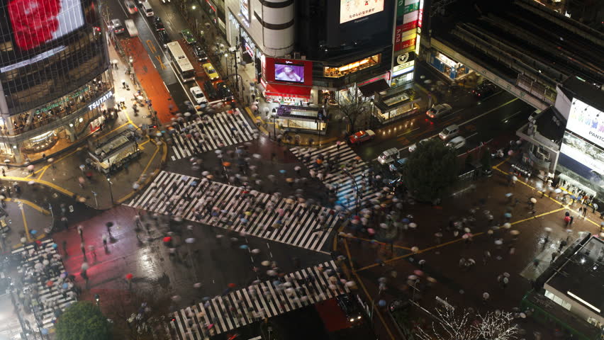 TOKYO, JAPAN - CIRCA MAY 2011: pedestrians and traffic across Shibuya Crossing, 
