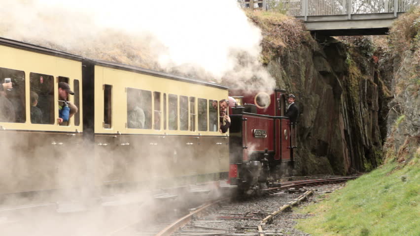 DEVILS BRIDGE, CEREDIGION/WALES - APRIL 7: Unidentified tourists take the steam train along the Vale of Rheidol on April 7, 2012 in Devil's Bridge. The train travels to Aberystwyth. 
