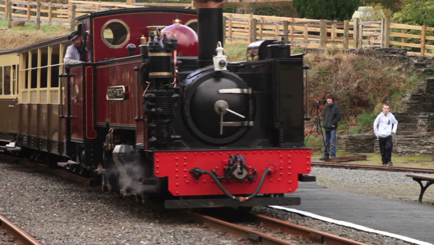 DEVILS BRIDGE, CEREDIGION/WALES - APRIL 7: Steam train pulls into Devil's Bridge with unidentified tourists on April 7, 2012 in Devil's Bridge. The train travels from Aberyswyth.