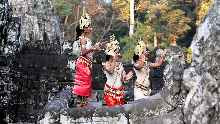 ANGKOR WAT, CAMBODIA - CIRCA MAY 2011: Traditional Cambodian apsara dancers, temples