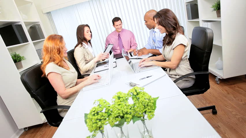 Young advertising agency team working modern wireless technology
