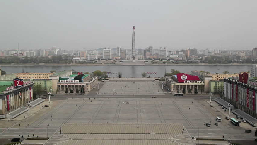 Pyongyang, elevated view across Kim Il Sung Square towards the Tower of the Juche Idea and Taedong river