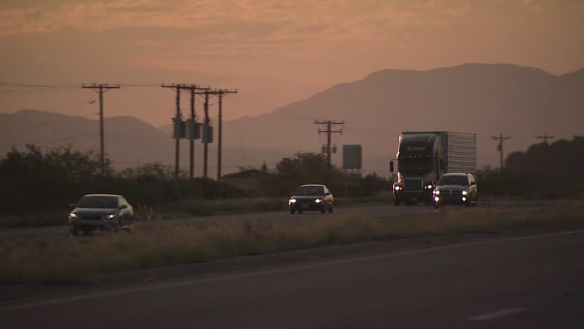ARIZONA - CIRCA 2010: Cyclists In A Road Race As They Climb A Hill 