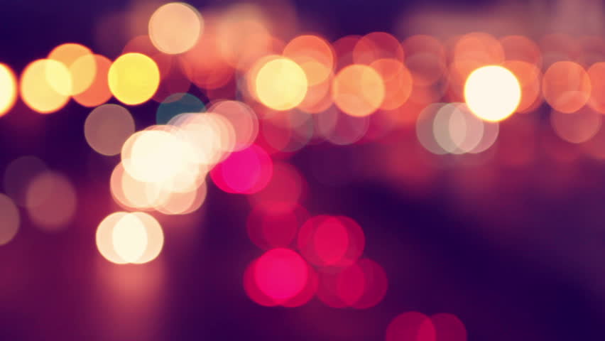 Night city is defocused with nice bokeh and typical city noise