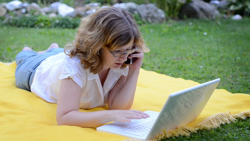 girl lies on a meadow