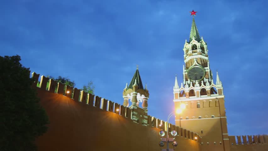 Kremlin wall with Tsarskaja Bashnja near Spasskaya tower with thirty eight minutes past nine on clock in Moscow