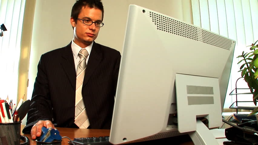 Ambitious young businessman in the workplace