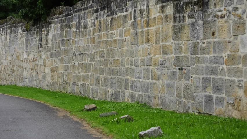 Abbey wall of Adelberg Germany with view to the three emperor mountains