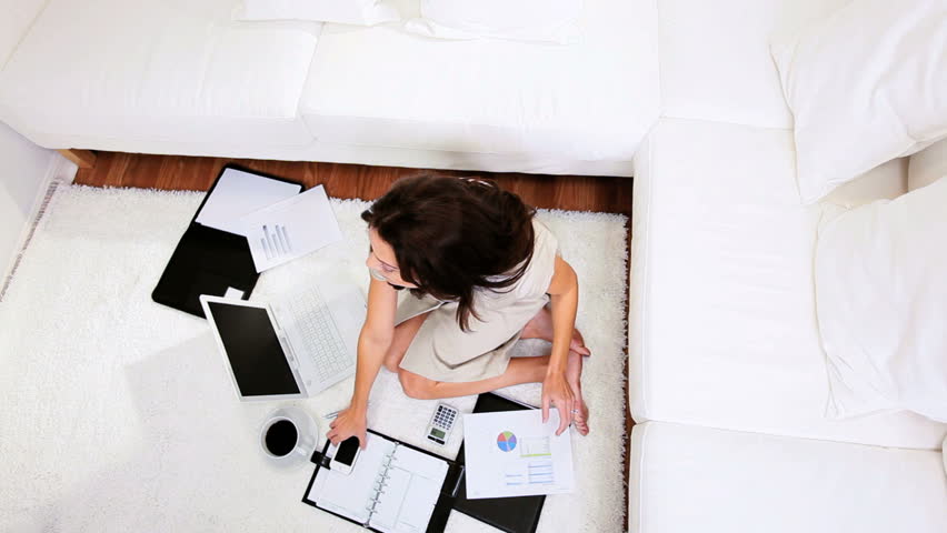 Female business women preparing documents for a deadline

