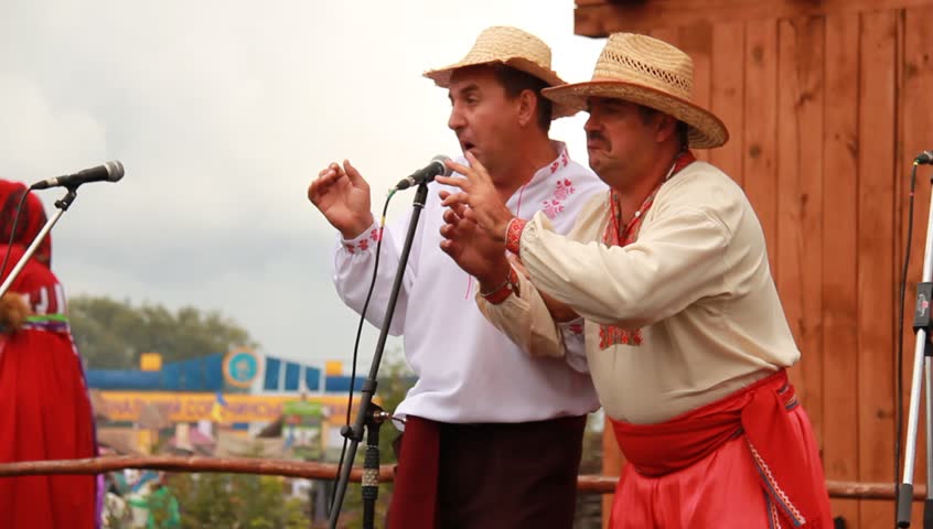 VELYKI SOROCHYNTSI, UKRAINE - AUGUST 17: Performers onstage at the Sorochyntsy Fair on August 17, 2012 in Velyki Sorochyntsi, Ukraine. This large fair has been held every year since the end of Soviet rule and was declared Ukraine's national trade fair in 