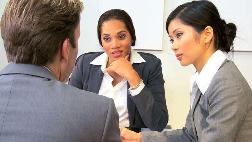 Close up young female Asian Chinese businesswoman modern office multi ethnic business colleagues
