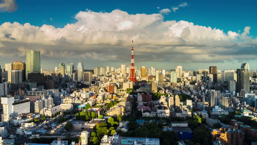 Tokyo is the world's most populous metropolis and is described as one of the three command centers for world economy August 21, 2012 in Tokyo, Japan.  Skyline. timelapse. Day to night. 