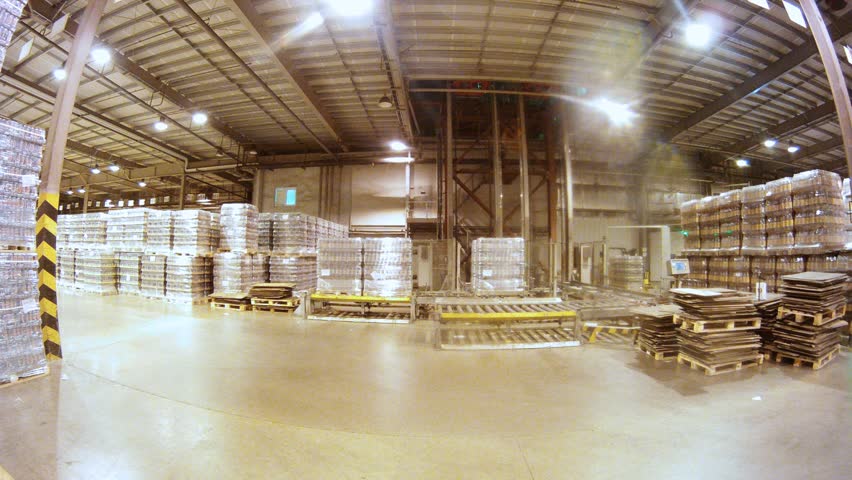MOSCOW - MAY 31: (Timelapse View) Loader Toyota delivers containers with kvass in lorry at of plant of low alcohol drinks Ochakovo, on May 31, 2012 in Moscow, Russia