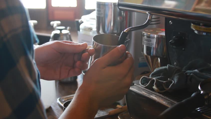 Steaming milk at Palace coffee shop.  