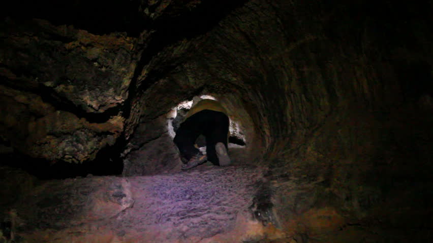 Lava Caves 12 Man get in small hole