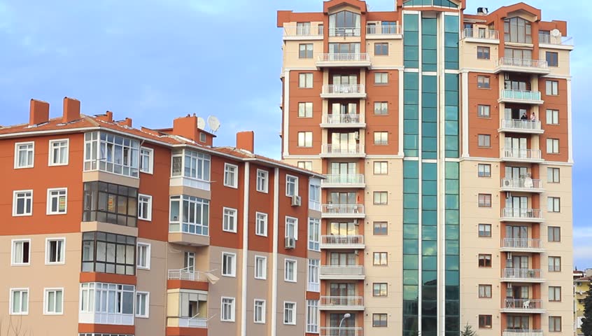Apartment building. Multistoried modern and stylish living block of flats.
