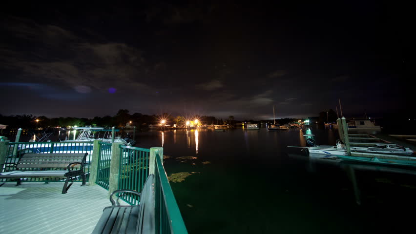 Florida Marina Night Cloud and Boat Time-Lapse Video with Boardwalk Motion
