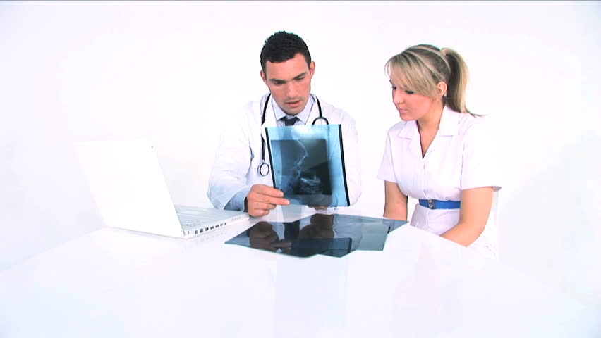 Young medical staff examining medical records