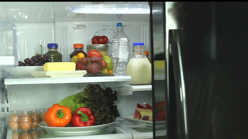 Man takes gallon of milk out of refrigerator. 1080p