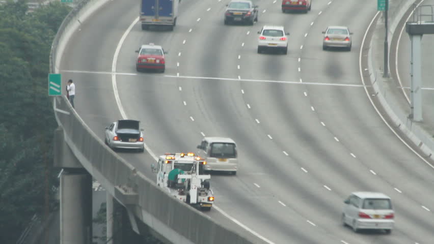 The broken down car on side of road