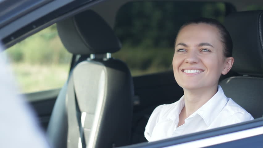 Young businesswoman is getting keys