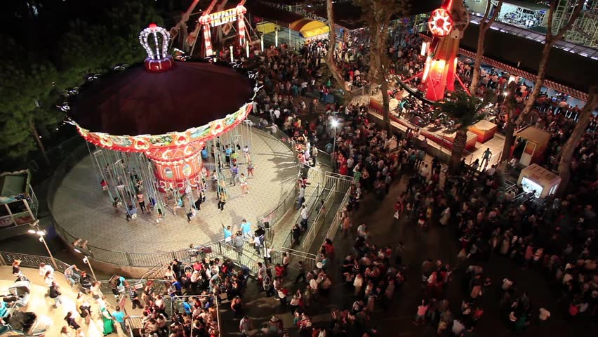 amusement park and crowded people. aerial view.  