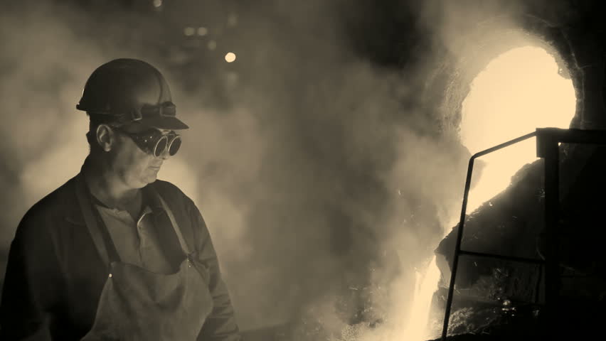 Hard work in the foundry, sepia old film motionphoto
