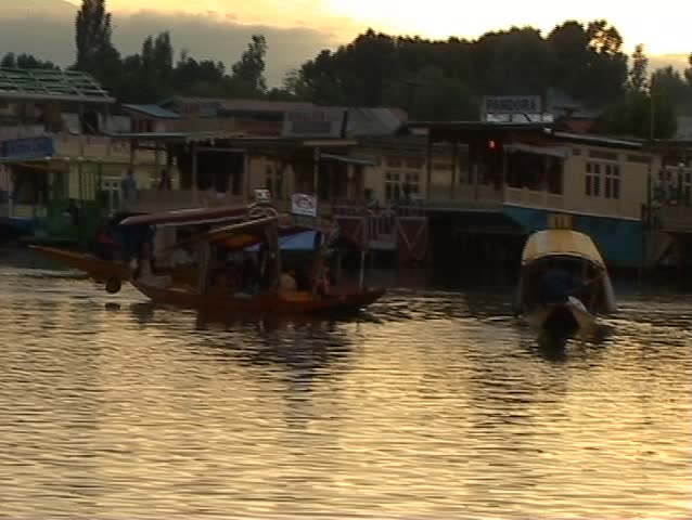 Shikara boats and houseboats on Dal lake in Kashmir