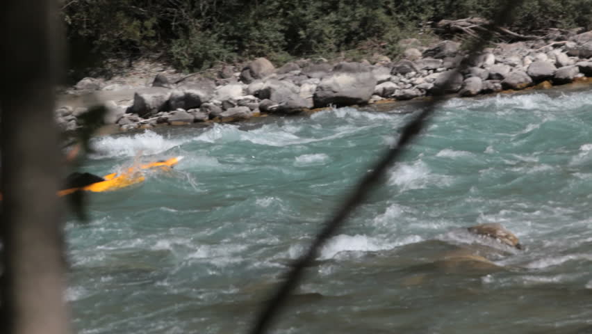 moving through a rapid in a white water river in france in a canoe or kayak