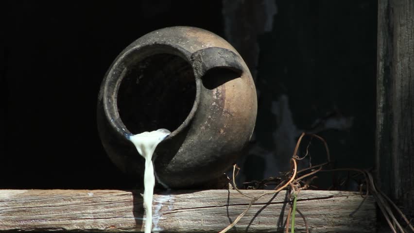 milk runs from the jug.earthenware,
