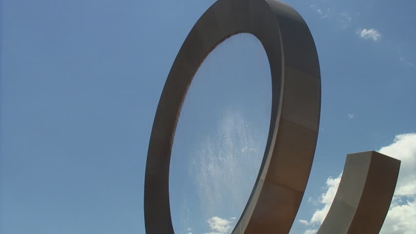 Low angle view of rotating water fountain sculpture